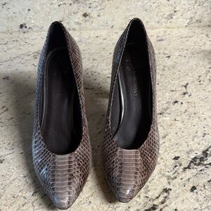 These leather heels are 4 inches are in very good condition. They are size 8.